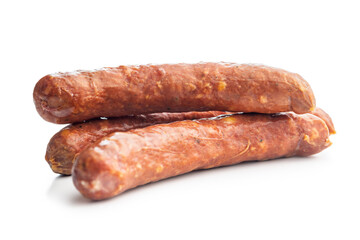 Smoked sausages isolated on white background.