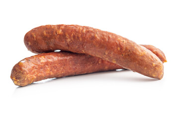 Smoked sausages isolated on white background.