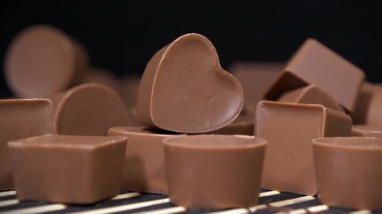 Valentines Day Gift. Chocolate candies. Delicious chocolate candy of different forms, including heart-shaped ones
