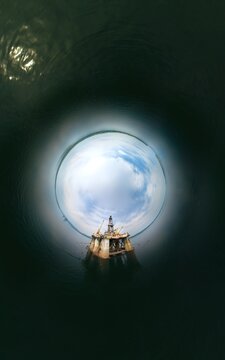 Abandoned oil well plug rig, rabbit hole tiny planet 360 effect