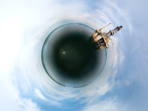 Oil rig decommission - aerial tiny planet small world spherical pano
