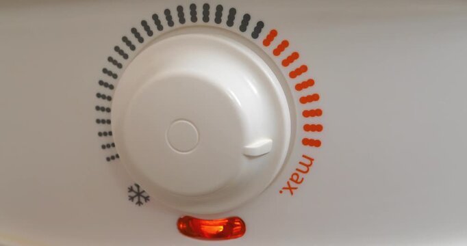 Temperature regulator for heating cold water in boiler. Red light indicator went out - boiler heated up cold water and turned off after heating water. Boiler heats water from cold water supply system