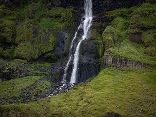 Bjarnafoss Waterfall in mountains in Iceland
