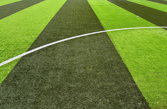 Fototapeta soccer field in two shades of green