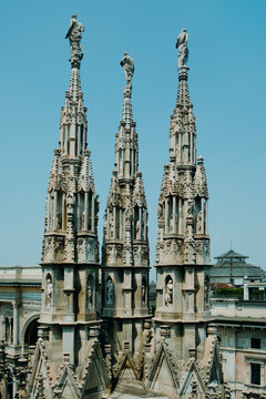 spires and statues overlook the Galleria Vittorio Emanuele in Milan