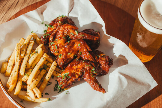 Spicy wings and cold beer