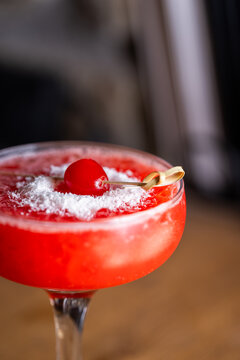 Forest fruit cocktail drink. Raspberry smash mocktail on bar counter