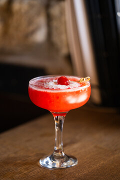 Raspberry smash mocktail / cocktail drink on bar counter