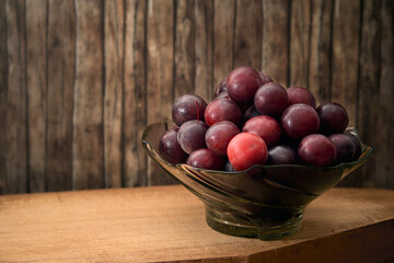 Cherry Plums in a Glass Bowl.