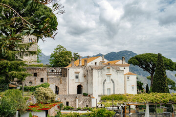 Old Italian villa with mountains in the background