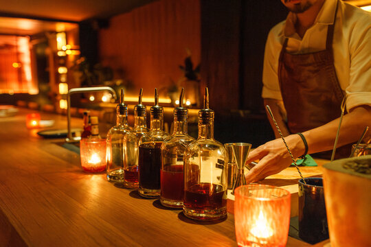 Bartender preparing cocktail at a stylish bar