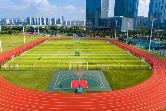 Drone view of a large campus sports ground including a soccer field