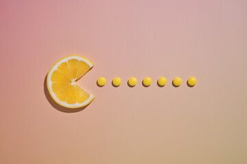 A lemon slice creatively mimics a video game character eating pills