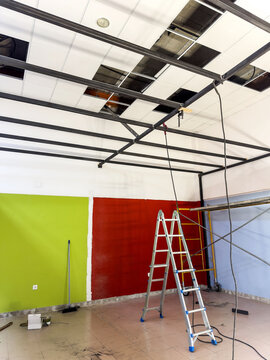 Interior of Commercial Space Under Renovation with Tools Visible