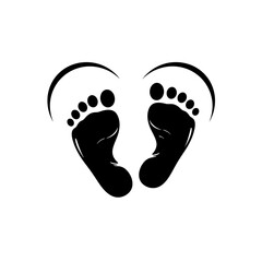 Adorable black baby footprints forming a heart shape on a white background symbolizing love