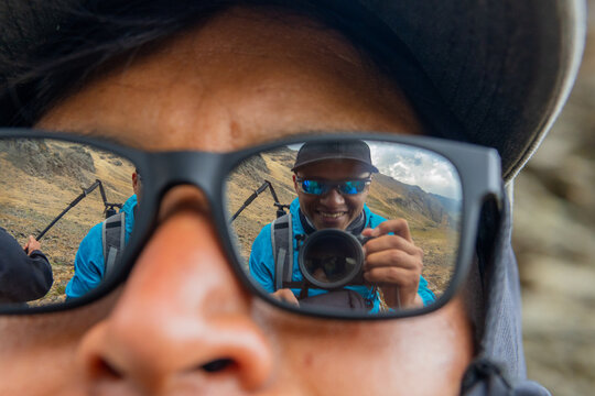Outdoor Adventure With Reflection in Sunglasses During Hike