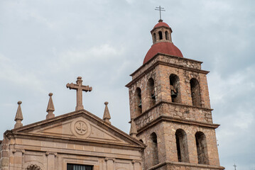 Streets, landscapes, and architecture of Morelia, Michoacan, Mexico, pink quarry church tower