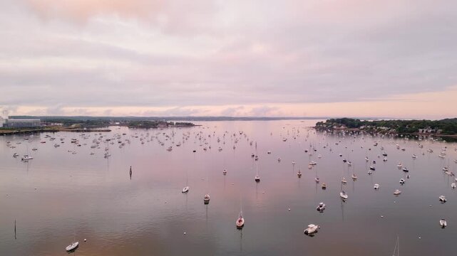 Boats in Salem Massachusetts harbor at sunset 