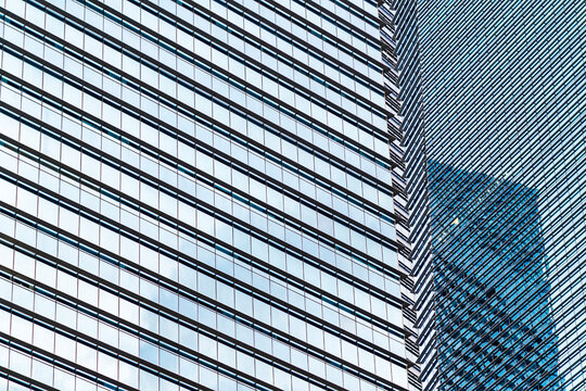 Corporate glass geometry shaping the urban skyline 