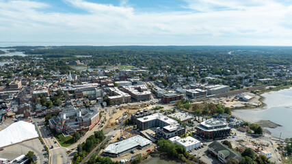 Aerial view of downtown Portsmouth, New Hampshire with historic buildings, waterfront development, and surrounding residential neighborhoods.