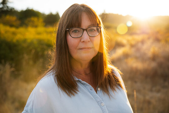 Woman in Scenic Golden Light