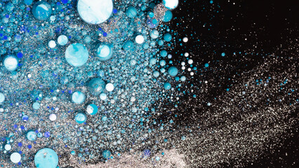 Abstract blue turquoise bubbles texture on dark background cosmic liquid art design