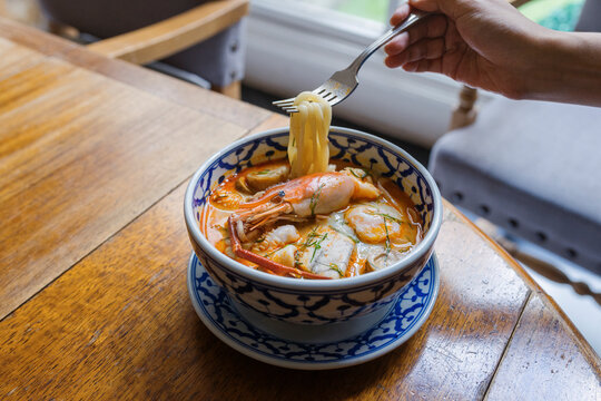 Thai Japanese mixed dish Tom Yum Kung udon