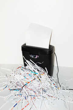 Paper shredder chipper and paper chaff in work business office 