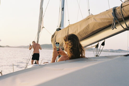 People enjoy their time sailing in the Mediterranean