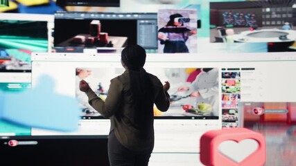Person watches multimedia collage of modern social media networks videos. African american woman looks at visualization of data driven world with content in constant motion, camera A - Powered by Adobe