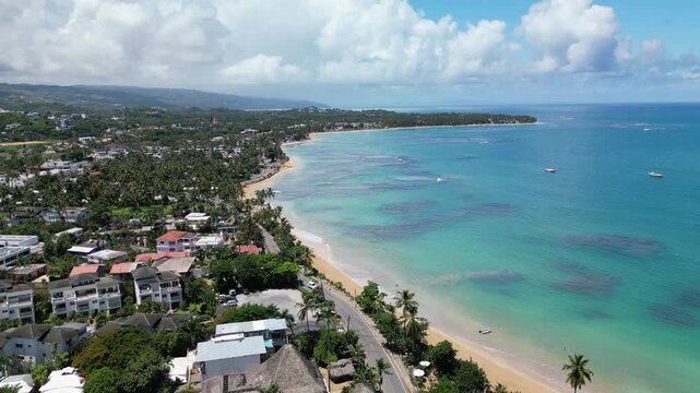 4K drone footage of Punta Popy Beach &mdash; sandy shoreline, ocean horizon, and palms. Perfect for tourism campaigns
