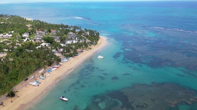 Drone capture of Punta Popy Beach &mdash; sandy shore, tropical palms, and clear Caribbean waters. Perfect for tourism boards. Filmed 17 august 2025, Las Terrenas, Dominican Republic