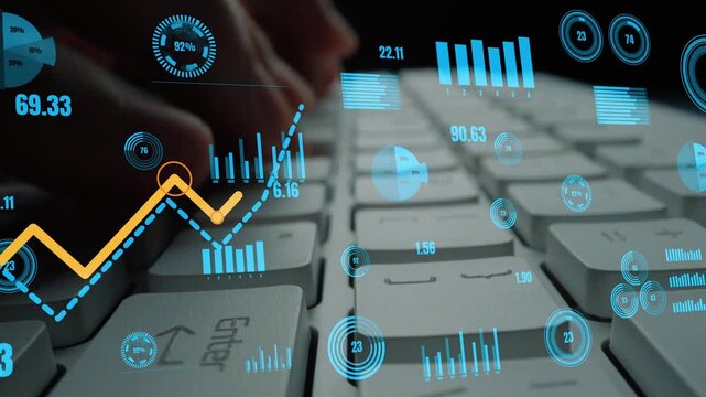 A close-up view of a keyboard with digital data visualizations including graphs and metrics, illustrating the integration of technology in business and finance analysis. Xenic - Powered by Adobe