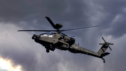Modern Air Power. Army gunship helicopter, Dark thundery skies.