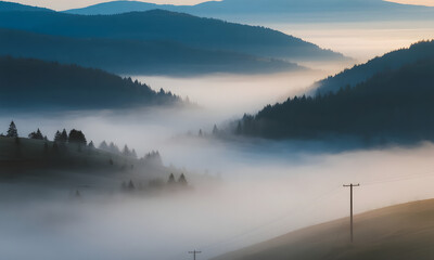 Foggy canyon with power lines