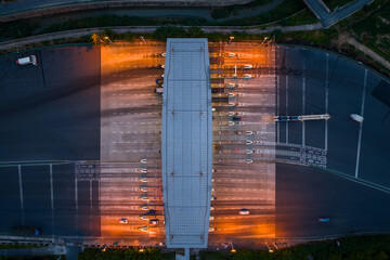 Aerial Timelapse View of Highway Toll Station at Dusk