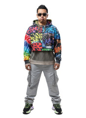 Fototapeta premium Stylish man in colorful streetwear, sunglasses, and chains, showcasing urban fashion and confident attitude on white background.