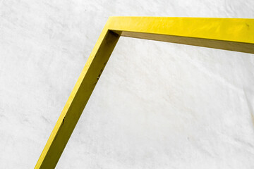 Minimalist Yellow Frame Against White Wall