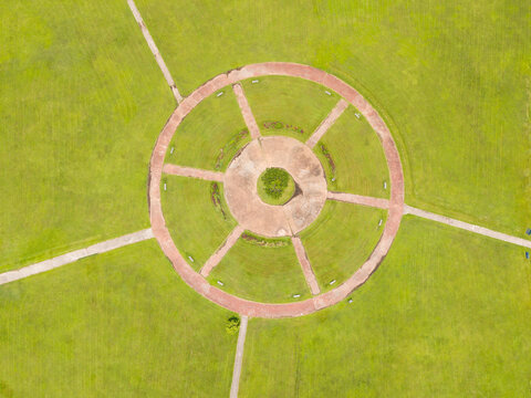 Aerial view of a circular park with radiating paths