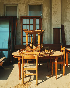 Wooden Furniture Arranged Outside at flea market in Italy