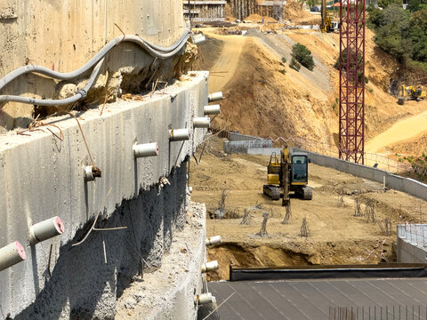 Excavation Site with Machinery and Reinforced Concrete Structures