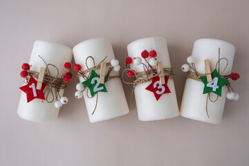 DIY process of woman making Christmas arrangement of advent candle calendar four weeks. Series of handmade craft instruction. Zero waste eco-friendly winter holiday decoration. New year top view, flat