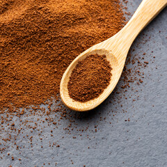 Organic dry coffee in a spoon - Coffea