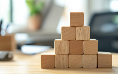 Wooden Blocks Stacked in Pyramid Shape on Desk, Business Concept, Growth, Success