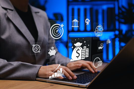 Financial Technology and Money Management Concept. Businesswoman working on laptop with icons representing online banking, digital money, investment growth, savings, transaction, financial technology