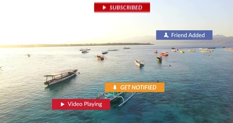 Obraz premium Small outrigger boats gently drifting on turquoise sea at sunrise, with UI overlays