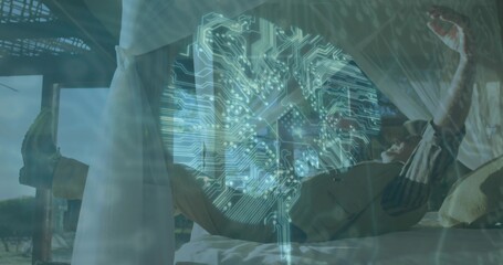 Reclining middle-aged man visualizing brain hologram on veranda bed, with mosquito net canopy