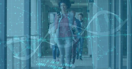 Walking woman in striped vest checking smartphone in modern office corridor, with DNA helix overlay