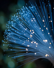 Illuminated Fiber Optic Cables: An up-close image showcases a bundle of illuminated fiber optic cables, radiating a brilliant glow, symbolizing modern digital communication and connectivity.