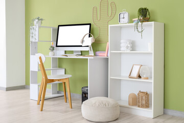 Obraz premium Interior of office with inventor's workplace and shelf unit